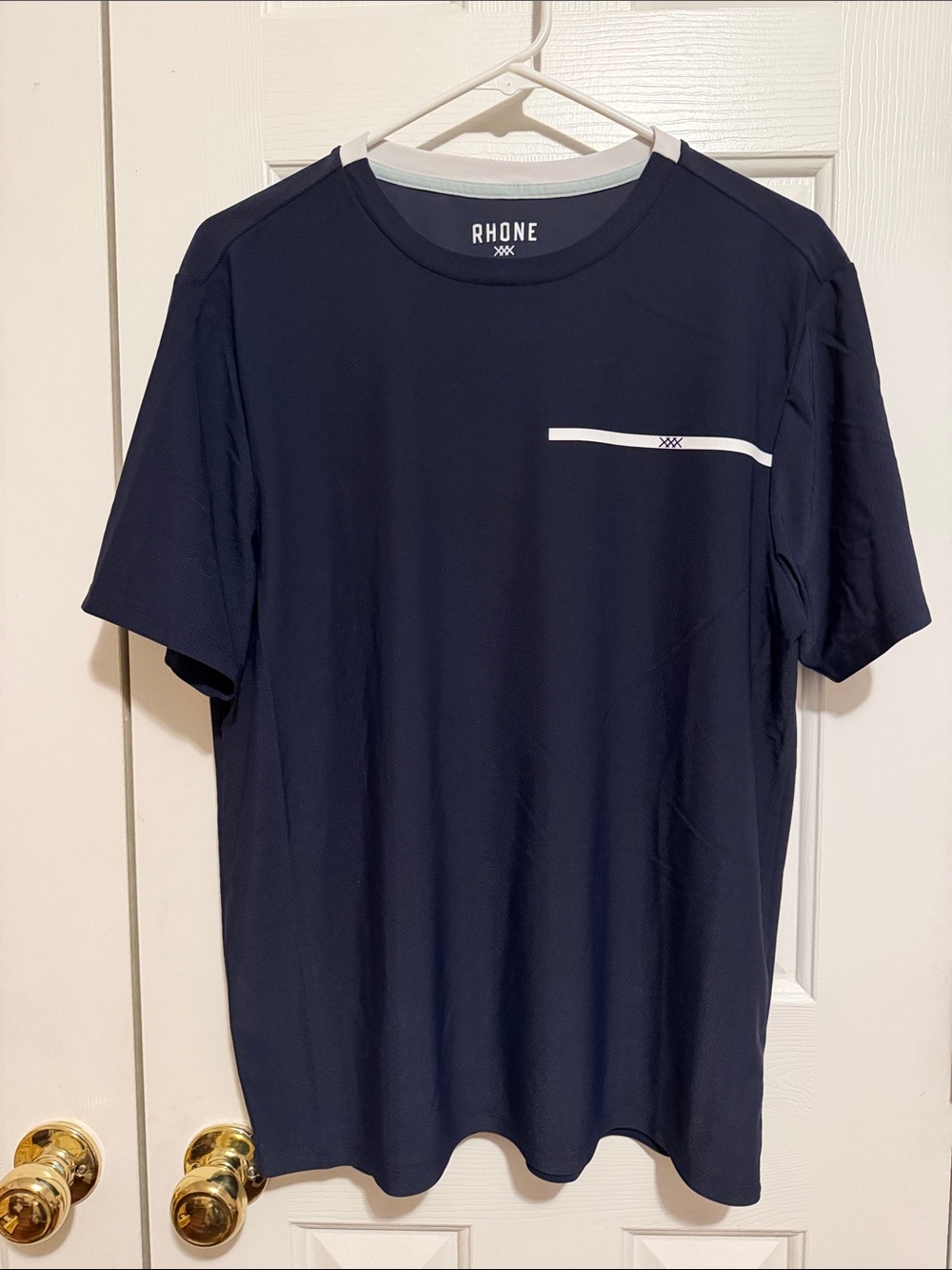 RHONE Navy Short Sleeve Athletic Tee with White Chest Accent